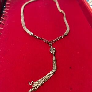 Elegant Gold Necklace with Tassel Pendant